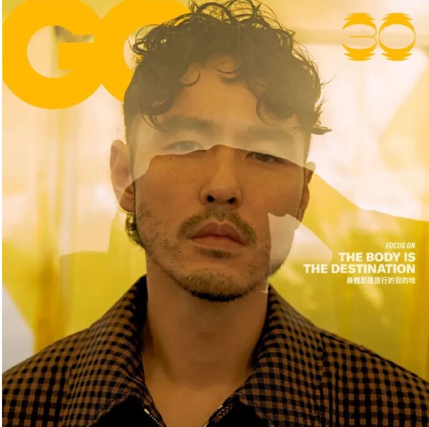 阮經天登《GQ》30周年封面　黃綠光影下，寫下成熟男人不必言說的故事。圖/取自微信